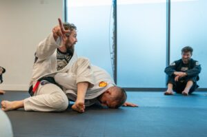 Demonstrating the importance of angles and pressure when applying techniques in Brazilian Jiu Jitsu and grappling